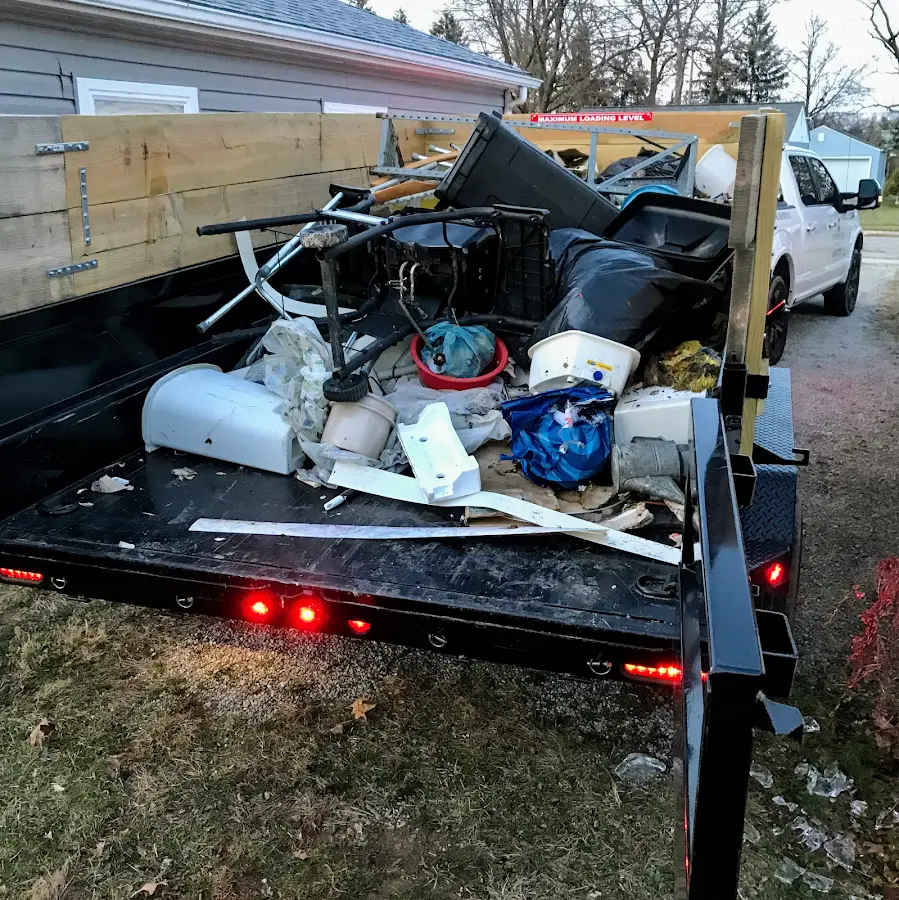 Roll-off dumpster delivered to a residential driveway in Five Corners